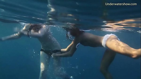 Naked couple swimming