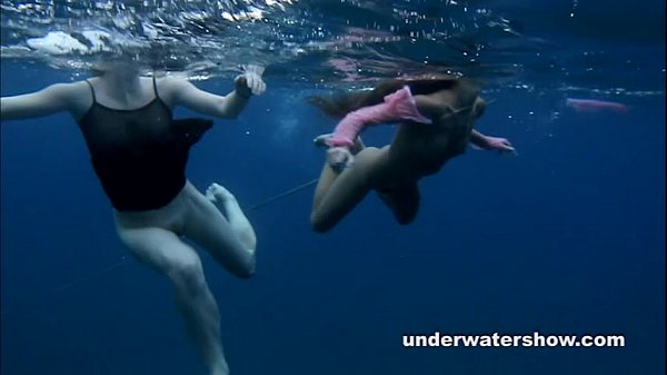 Nude women underwater