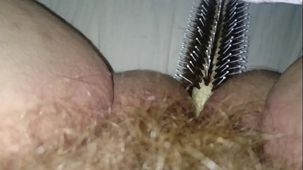 Masturbating with a brush
