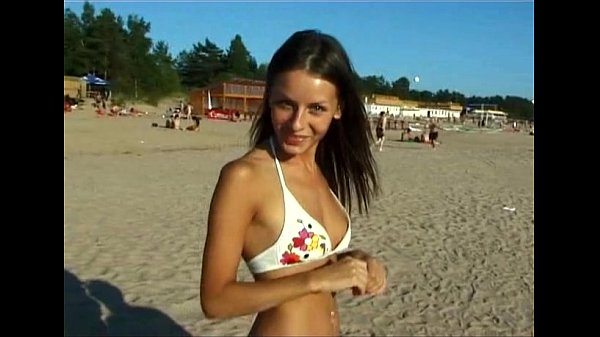 Girl strips on beach
