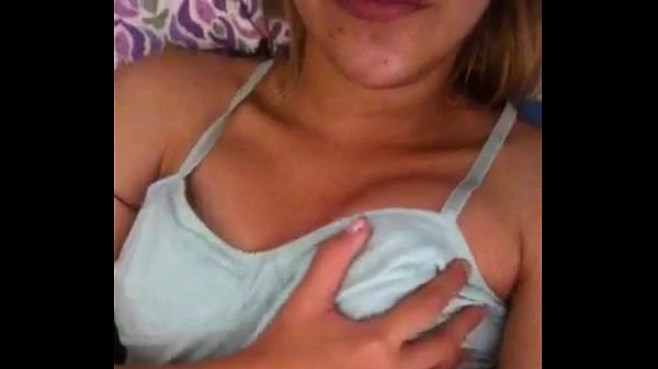 Woman pinching her nipples